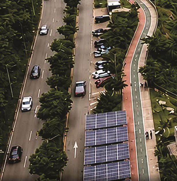 Render del bulevar con ciclorruta, parqueaderos con techo solar y vías iluminadas